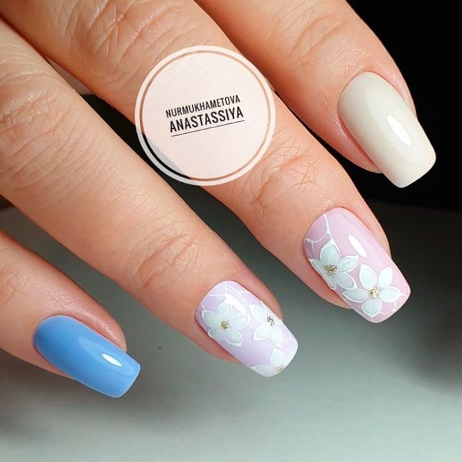 Сute Pastel Blue Nails With Spring Flowers