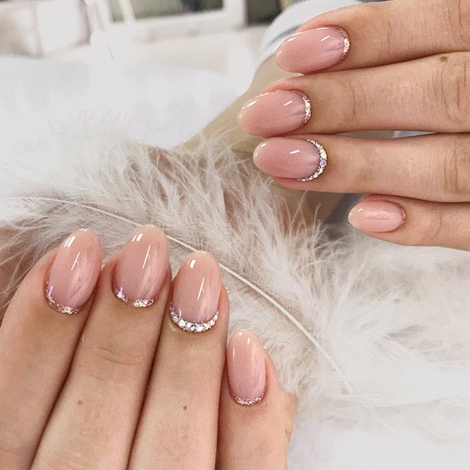 Gorgeous Sparkly Crescent Manicure #nudenails #ovalnails #crescentnails #rhinestonesnails