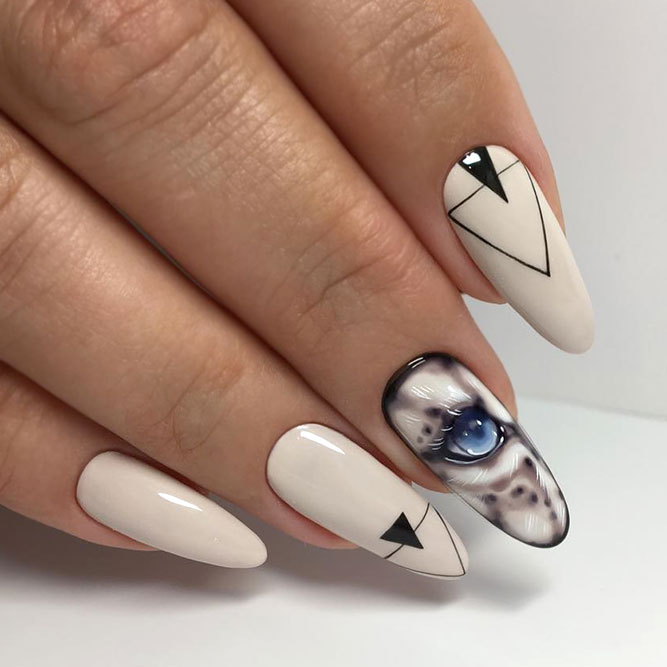 Beige Colored Nails With Geometrical And Cat Stickers Designs