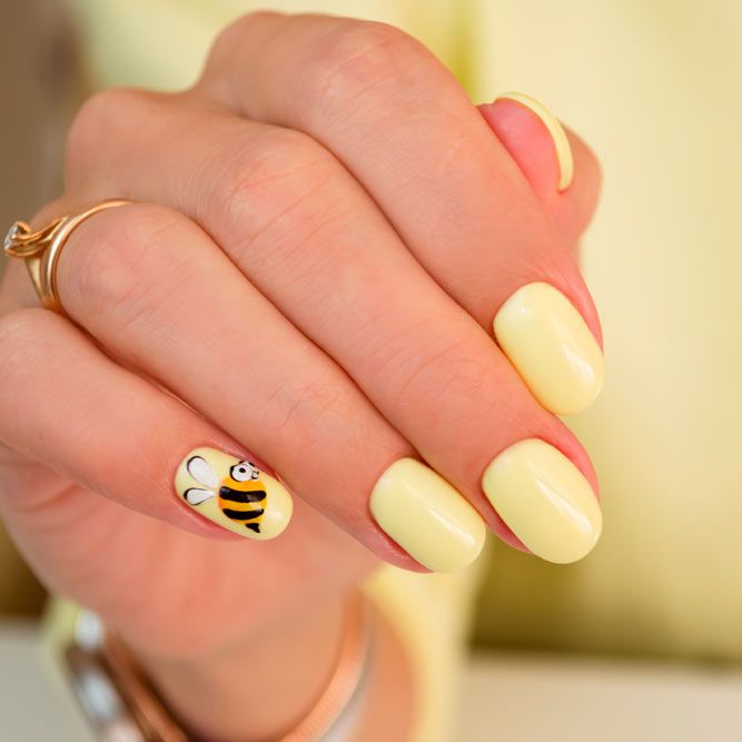Sweet Yellow Nails with Aminals Accent
