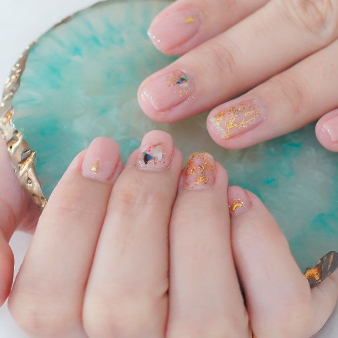 Festival Nail Design With Golden Decals