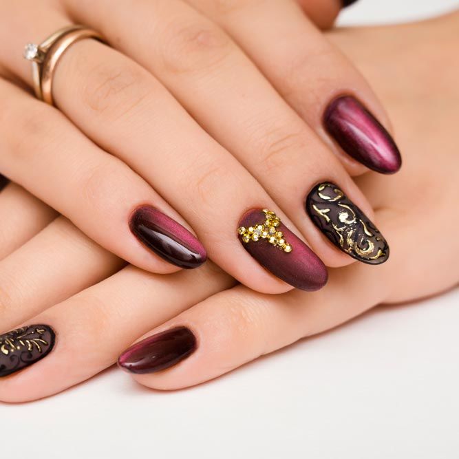 Burgundy Nails With Cat Eye Effect