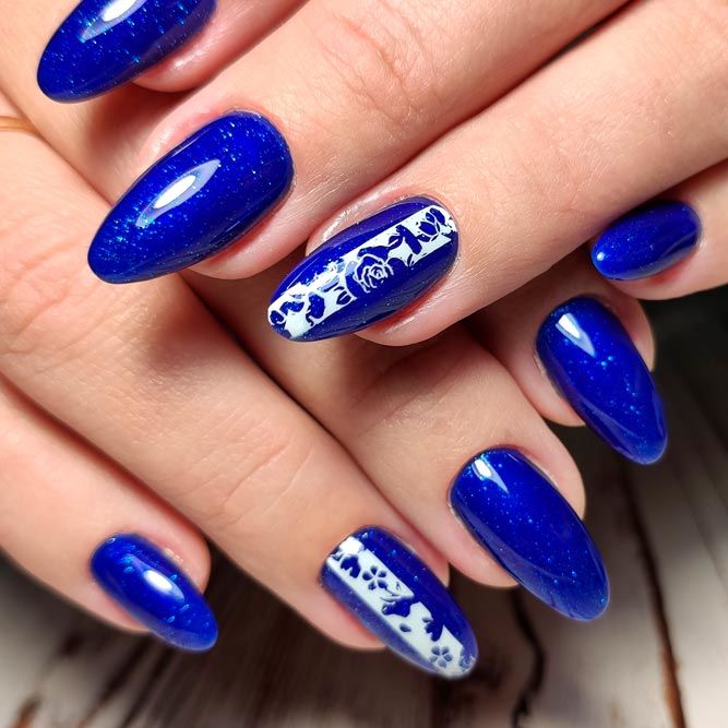 Blue Floral Patterns On Nails