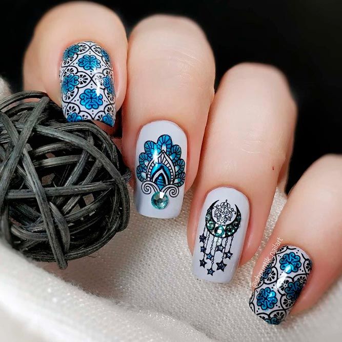 Blue Rhinestones And Mandala Nail Art