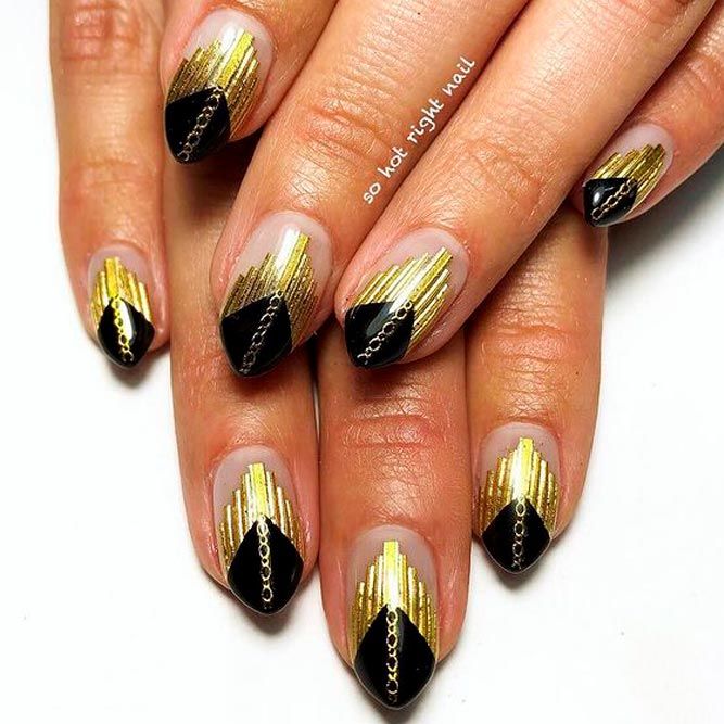 Beautiful Black and Gold Nails with Accents
