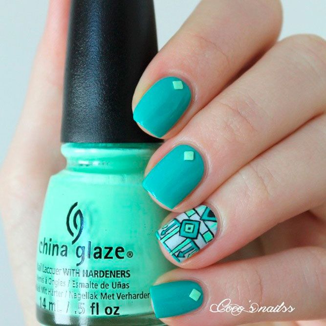 Cute Patterns on Teal Acrylic Nails