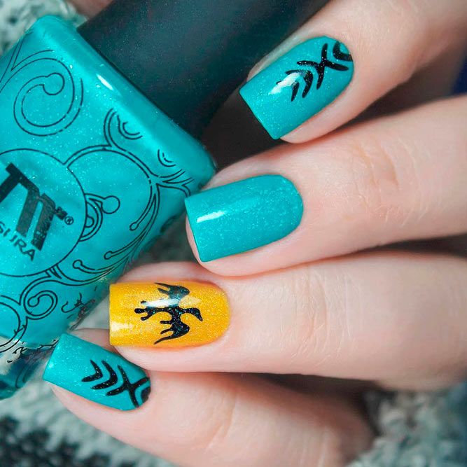 Patterns on Teal Acrylic Nails