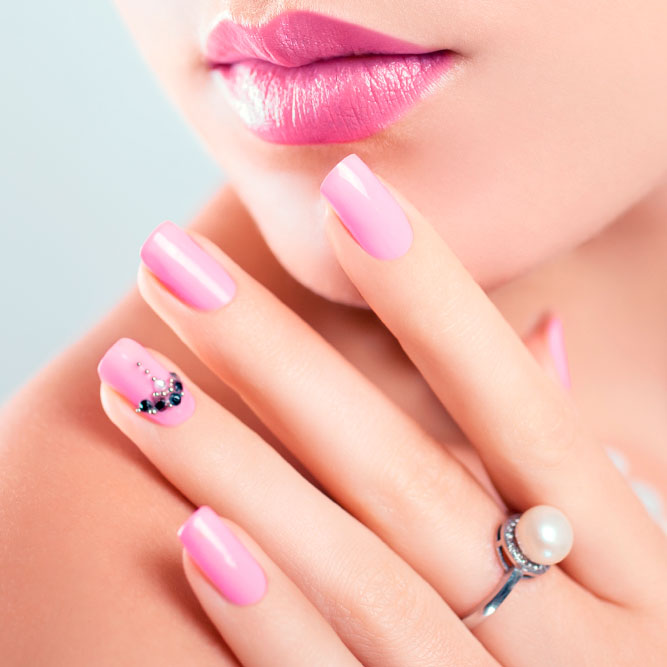 Pink Lipstick And Matching Nail Polish