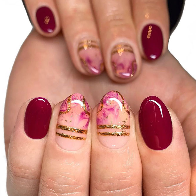 Maroon Nails with Golden Lines