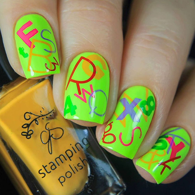 Bright Letters on Green Nails