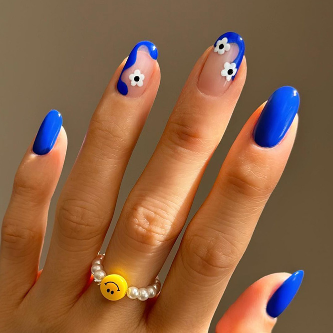 Daisies on Blue and Clear Nails