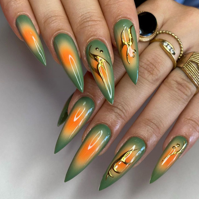 35 Cute Orange Nail Ideas To Rock in Summer : Gold and Orange Swirl Nails