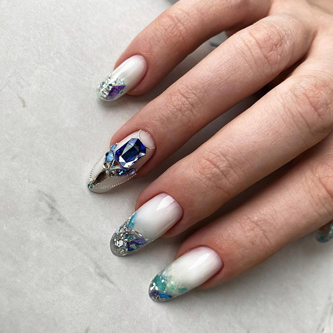 Milky White Nails with Blue Rhinestones